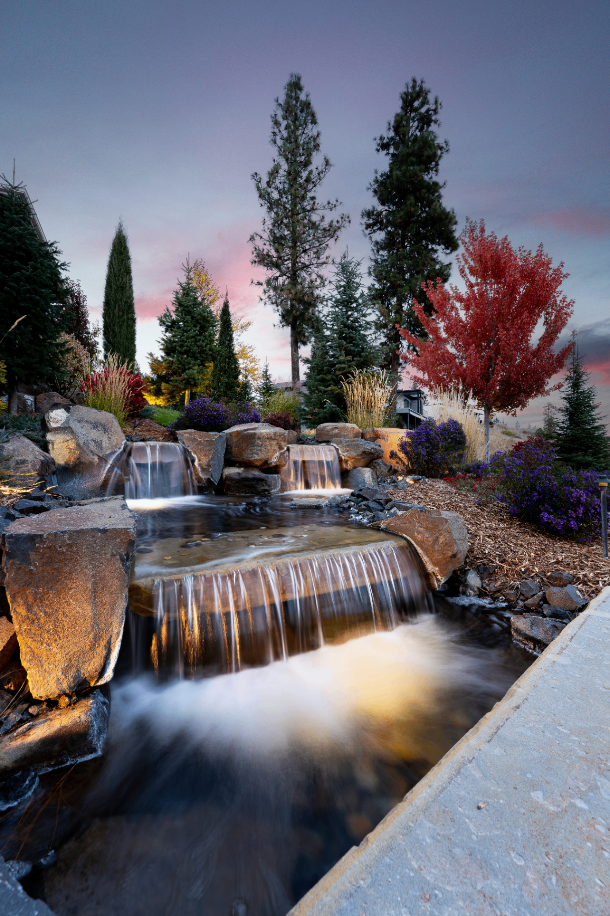 Spokane landscape waterfall at sunset by Valid Media